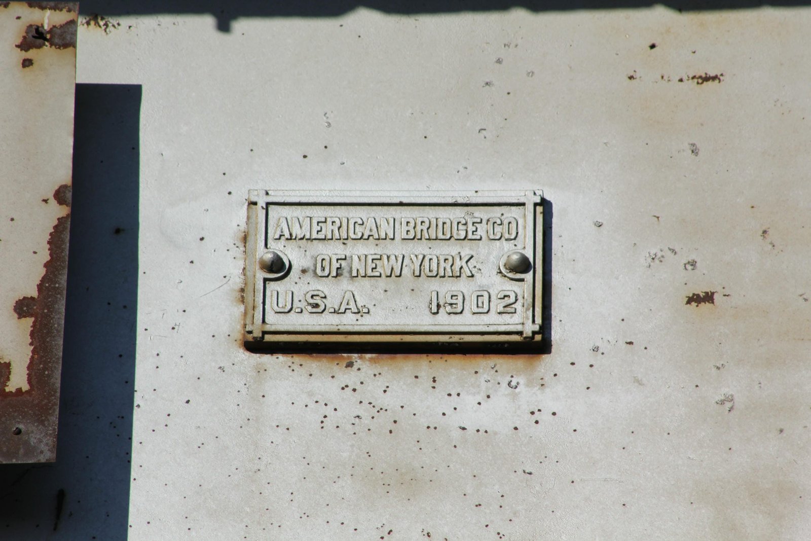 Plaque on center span